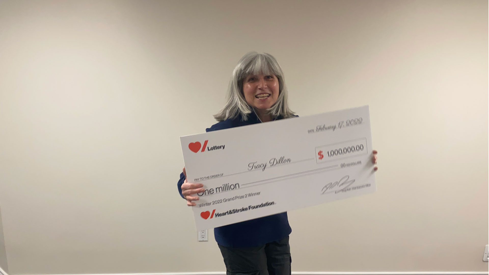  Tracy Dillon holding cheque