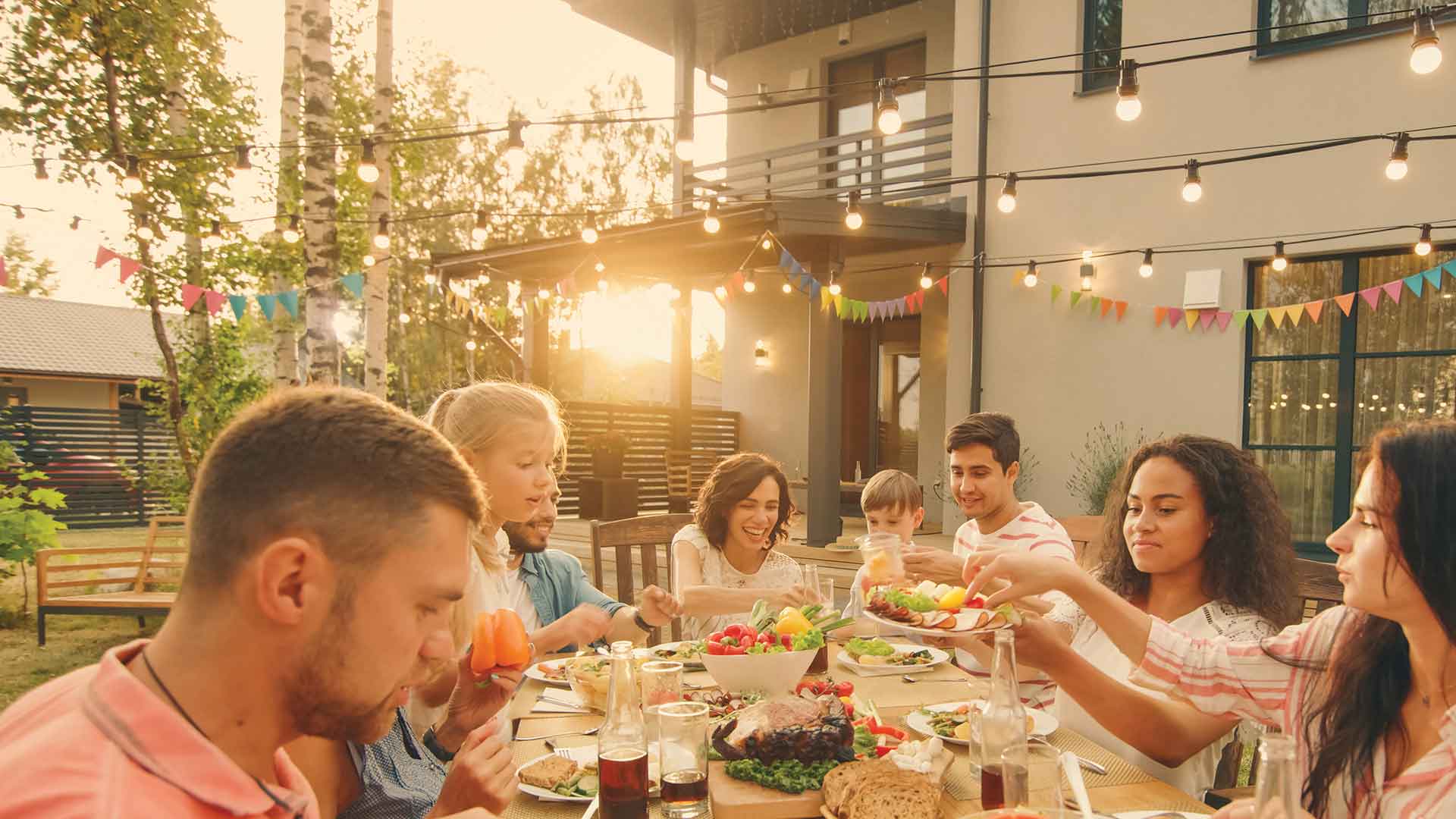 Portrait of a big family celebrating in a backyard