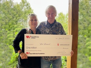 Spring 2025 Lottery – Grand Prize 1 Winner Leo Lessard holding a novelty cheque for his winning.