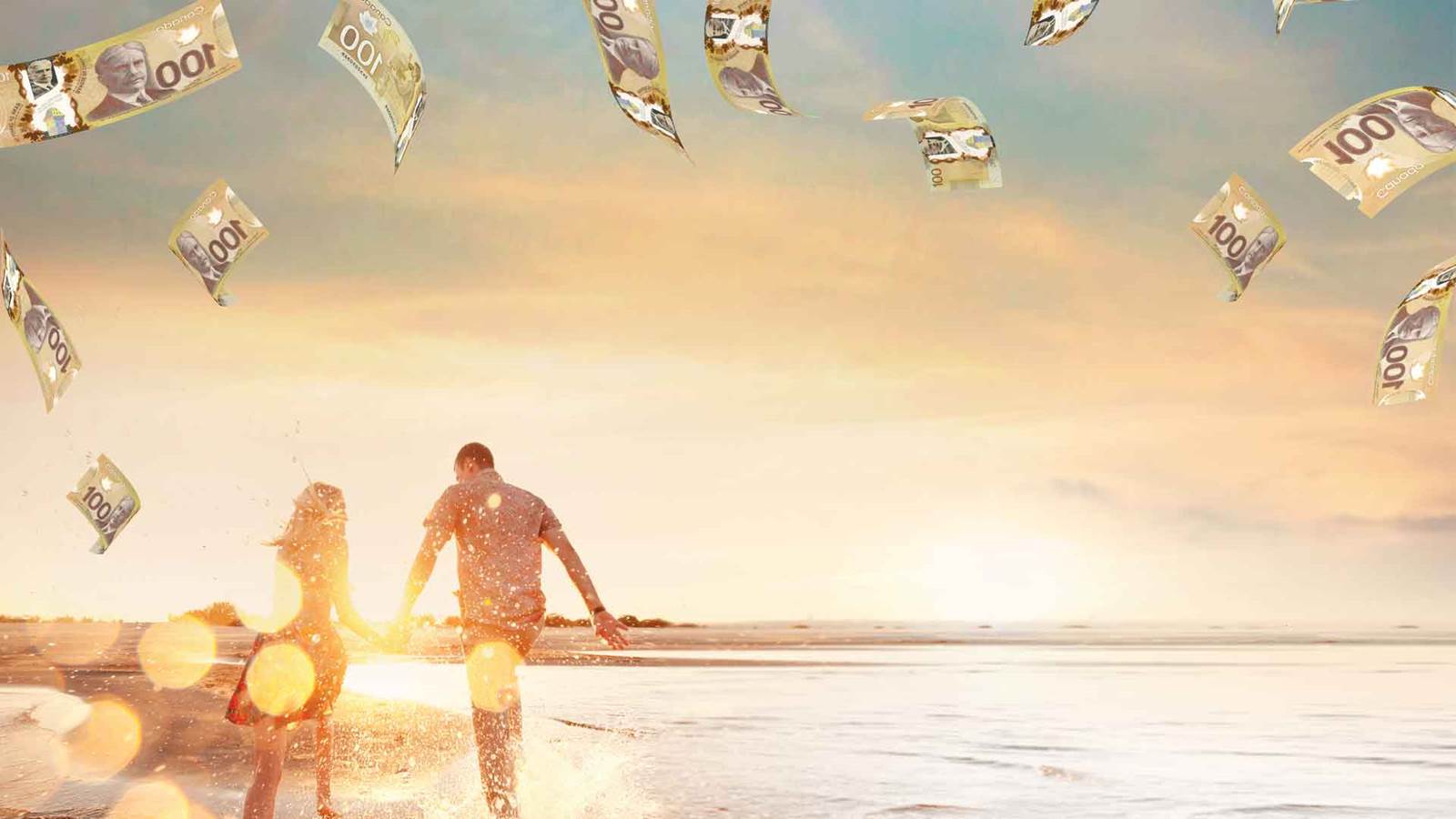 A couple walks on a sunset beach with money floating all around them