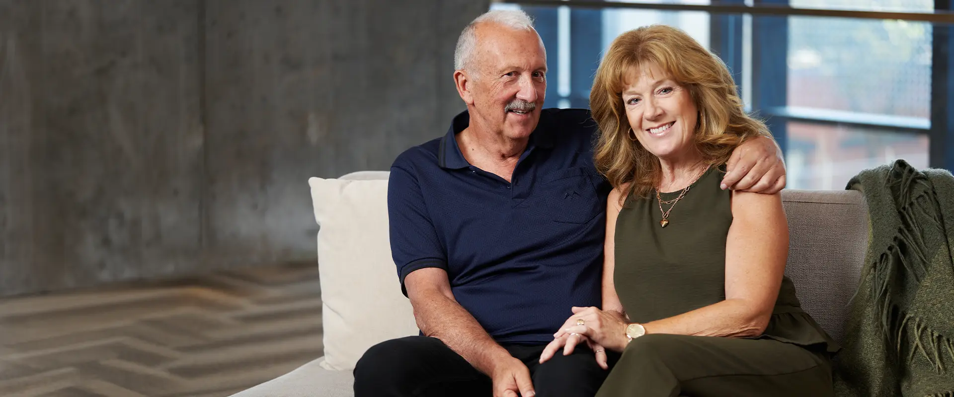 John Vipond, living with stroke, sitting with his wife Barb.