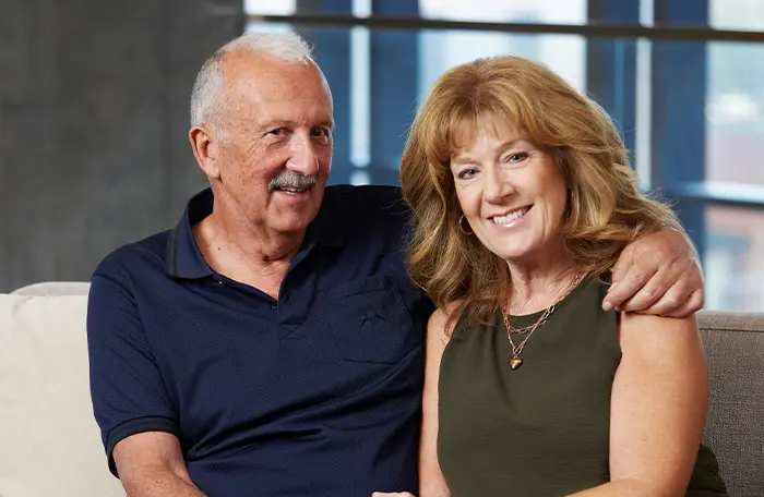 John Vipond, living with stroke, sitting with his wife Barb.